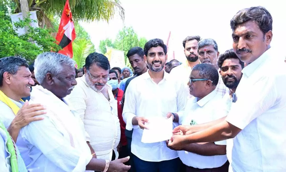 Sarpanches of Nandikotkur hand over a representation to TDP national general secreatary Nara Lokesh on Wednesday