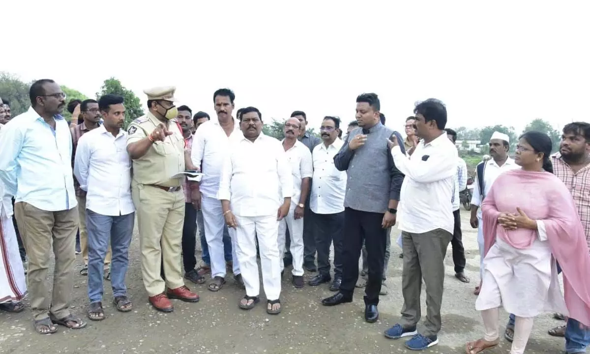 Deputy CM P Rajanna Dora and collector Nishanth Kumar inspecting road works in Parvathipuram on Wednesday