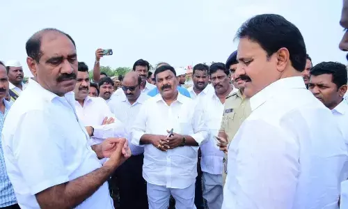 Social Welfare Minister Merugu Nagarjuna and Rajya Sabha Member Mopidevi Venkata Ramana Rao reviewing the arrangements for the CM’s visit in Nizampatnam on Wednesday