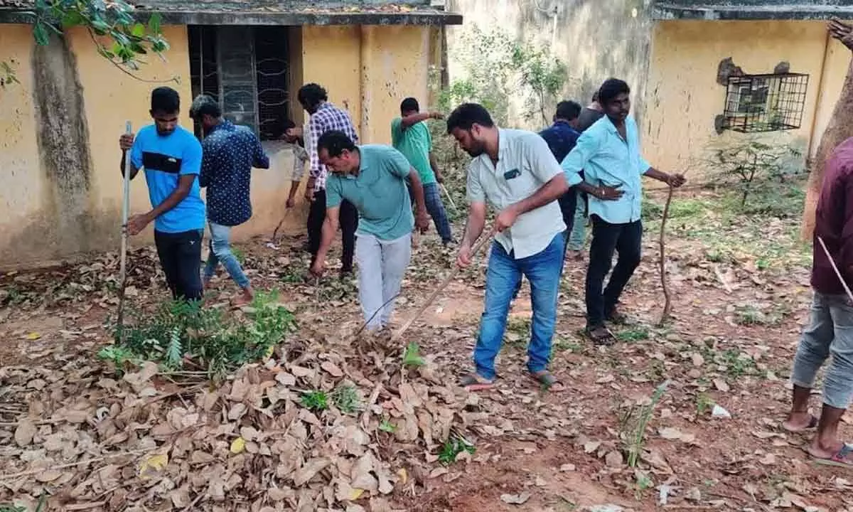 Tipplers cleaning the college premises as a part of their punishment in Visakhapatnam