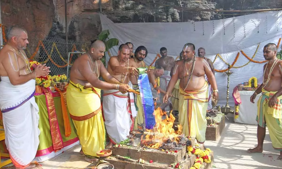 Priests conducting Poornahuti marking the conclusion of the 4-day Maha Samprokshanam at Sri Lakshmi Narasimha Swamy temple at Kapila Theertham in Tirupati on Sunday