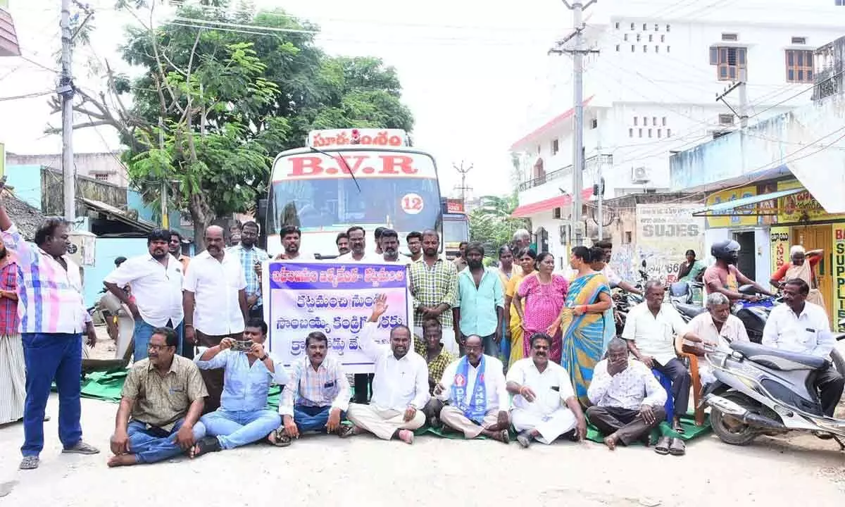 Dalits staging dharna for construction of road at Ambedkar Circle in Kattamanchi on Sunday