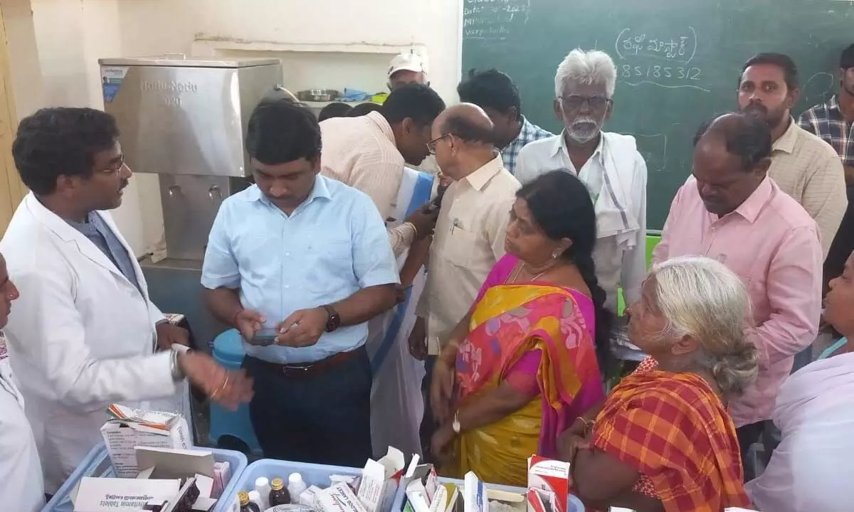 Palnadu district Collector Shiva Sankar Lotheti checking the records at the village health clinic in Vayyakalla on Tuesday