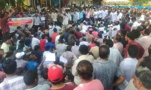 Trade union leaders staging a dharna at the administration building of the VSP in Visakhapatnam on Tuesday