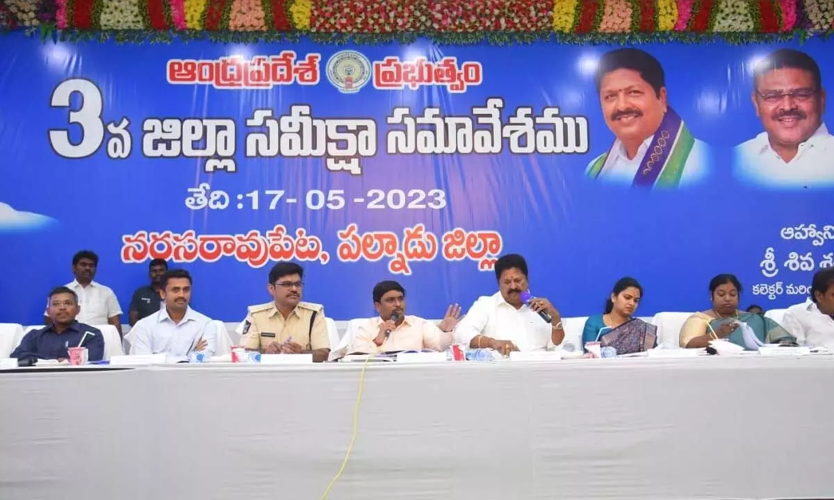 Palnadu district in-charge Minister Karumuri Venkata Nageswara Rao addressing DRC meeting in Narasaraopet on Wednesday. Ministers Vidadala Rajini and Ambati Rambabu, district Collector Shiva Sankar Lotheti are also seen.