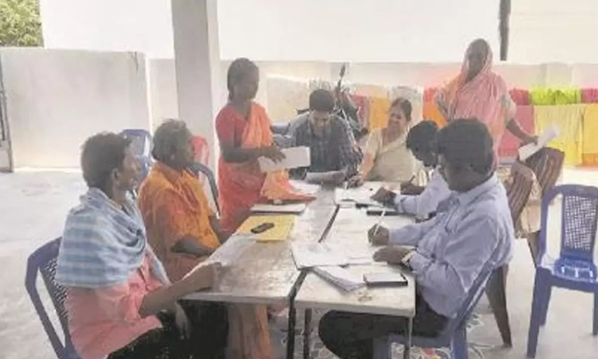 CBI and postal officials collecting details from customers in Dharmavaram village on Wednesday
