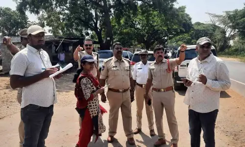 Police, NRAI and engineering officials inspecting blac spots on Khammam to Wyra road on Wednesday.