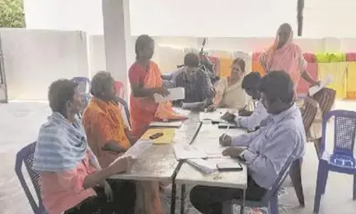 CBI and postal officials collecting details from customers in Dharmavaram village on Wednesday