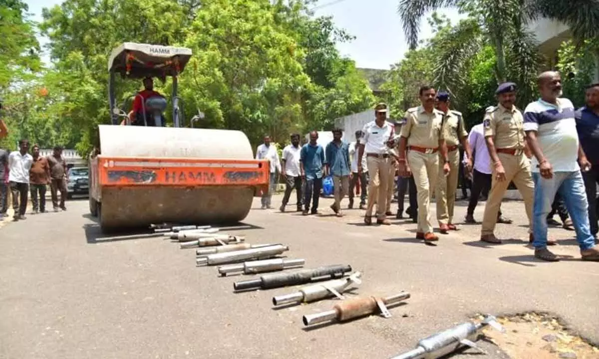 Seized modified sirens being crushed by a roller at City Police Commissionerate in Karimnagar on Thursday