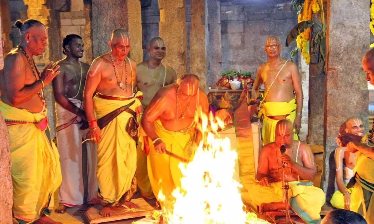 Priests performing rituals on the occasion of Maha Samprokshanam at Sri Govindaraja Swamy temple in Tirupati on Sunday