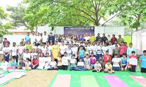 Divisional Railway Manager Anup Satpathy along with yoga camp participants in Visakhapatnam on Sunday
