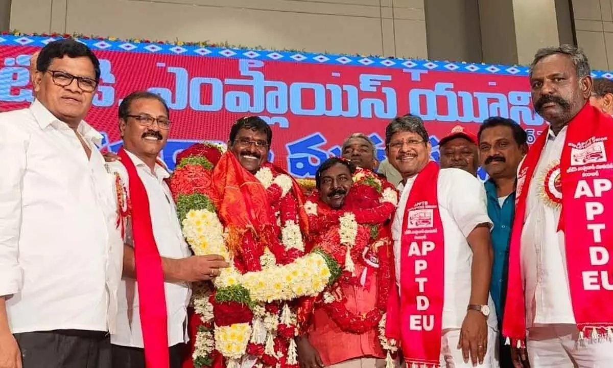 Public Transport Department Employees Union newly-elected president P Damodara Rao and general secretary G V Narasaiah being felicitated at the 27th State conference in Vijayawada on Wednesday