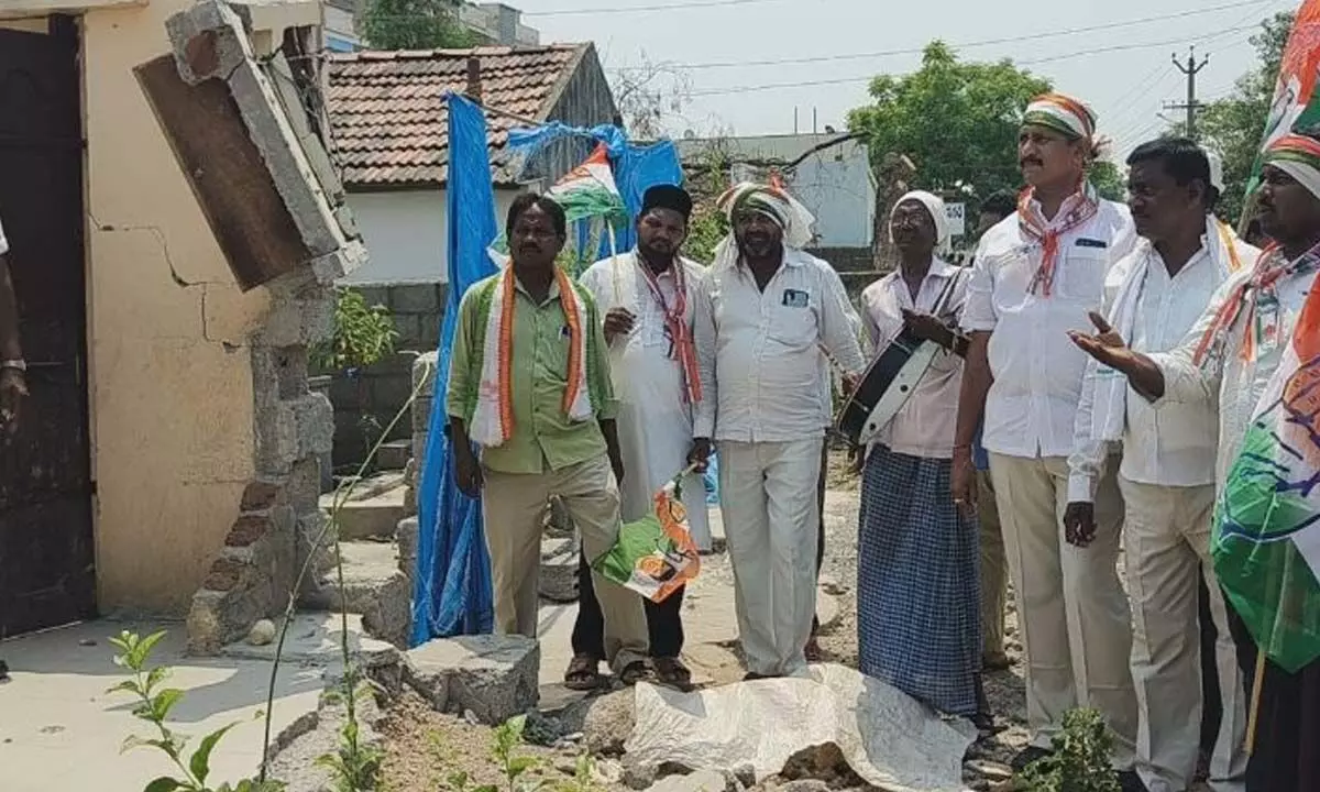 City Congress president Komati Reddy Narender Reddy inspecting the demolished houses in Karimnagar on Wednesday