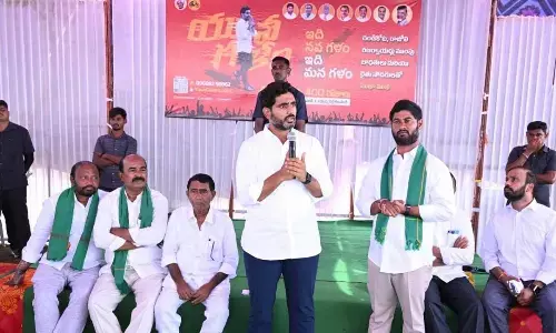 TDP national general secretary Nara Lokesh addressing Gandikota and Rajoli projects displaced families at camp site in Sudhupalle village in Jammalamadugu mandal on Wednesday