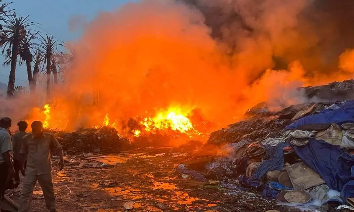 Heavy flames coming out at a storeroom of Parawada Pharma City in Anakapalli district on Sunday