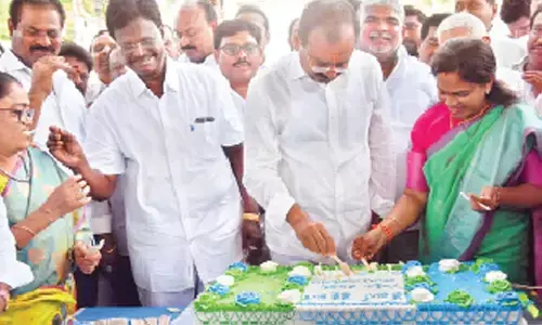 MLA Bhumana Karunakar Reddy cutting a cake in the presence of MLC Dr Cipai Subramanyam, Mayor Dr R Sirisha and others in Tirupati on Tuesday to mark the completion of four years of YSR rule in the State