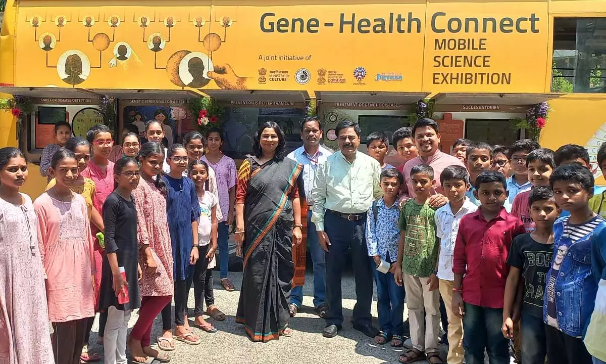 SV University Vice Chancellor Prof K Raja Reddy, Jyothi Mehra and Srinivasa Nehru with students at the mobile science exhibition in  Tirupati on Wednesday
