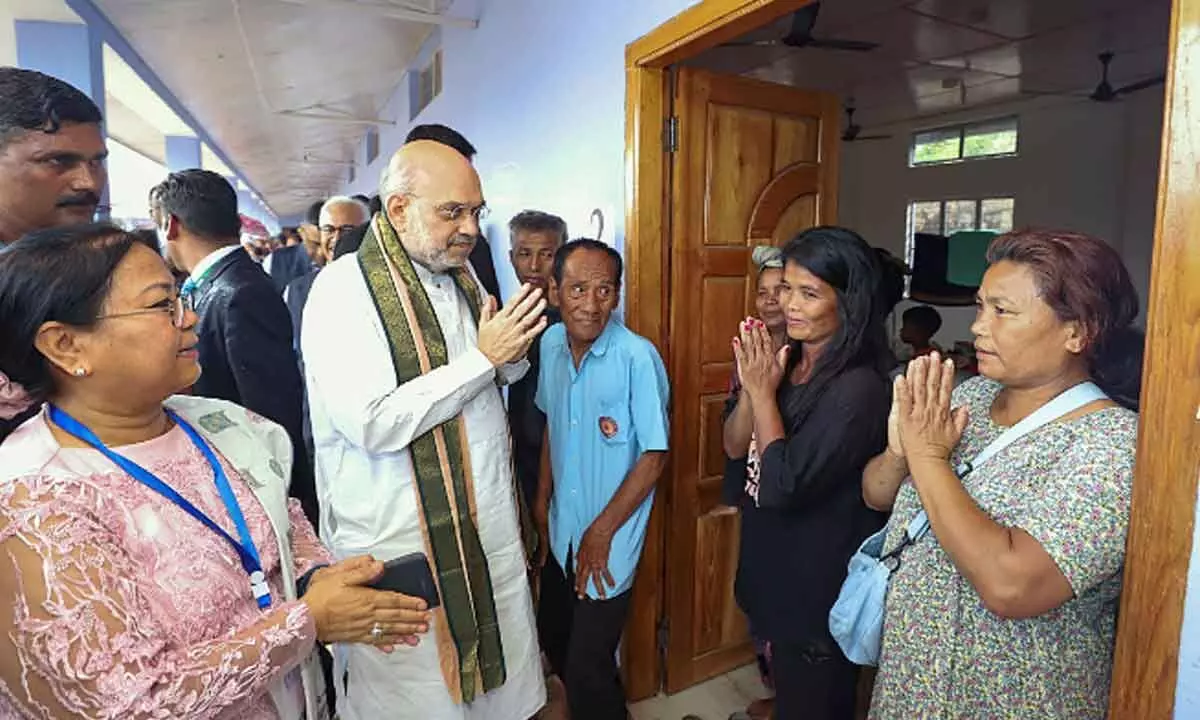 Union Home Minister Amit Shah meets people from the Kuki community at a relief camp, in Kangpokpi on Wednesday