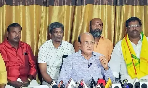 TDP Politburo member Gorantla Butchaiah Chowdhary addressing the media in Rajamahendravaram on Wednesday