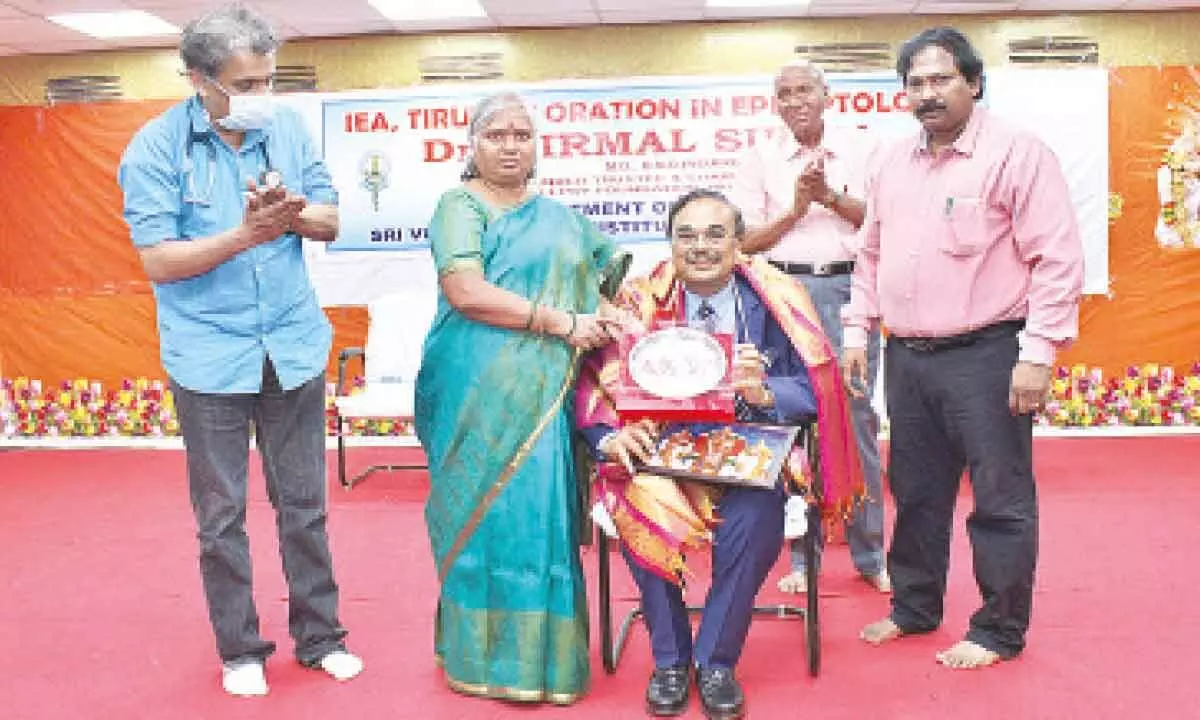 SVIMS Director Dr B Vengamma felicitating  Dr Nirmal Surya in Tirupati on Thursday.  Medical  Superintendent  Dr R Ram, DM&HO Dr U Sreehari  and Dr Raghava Reddy are seen