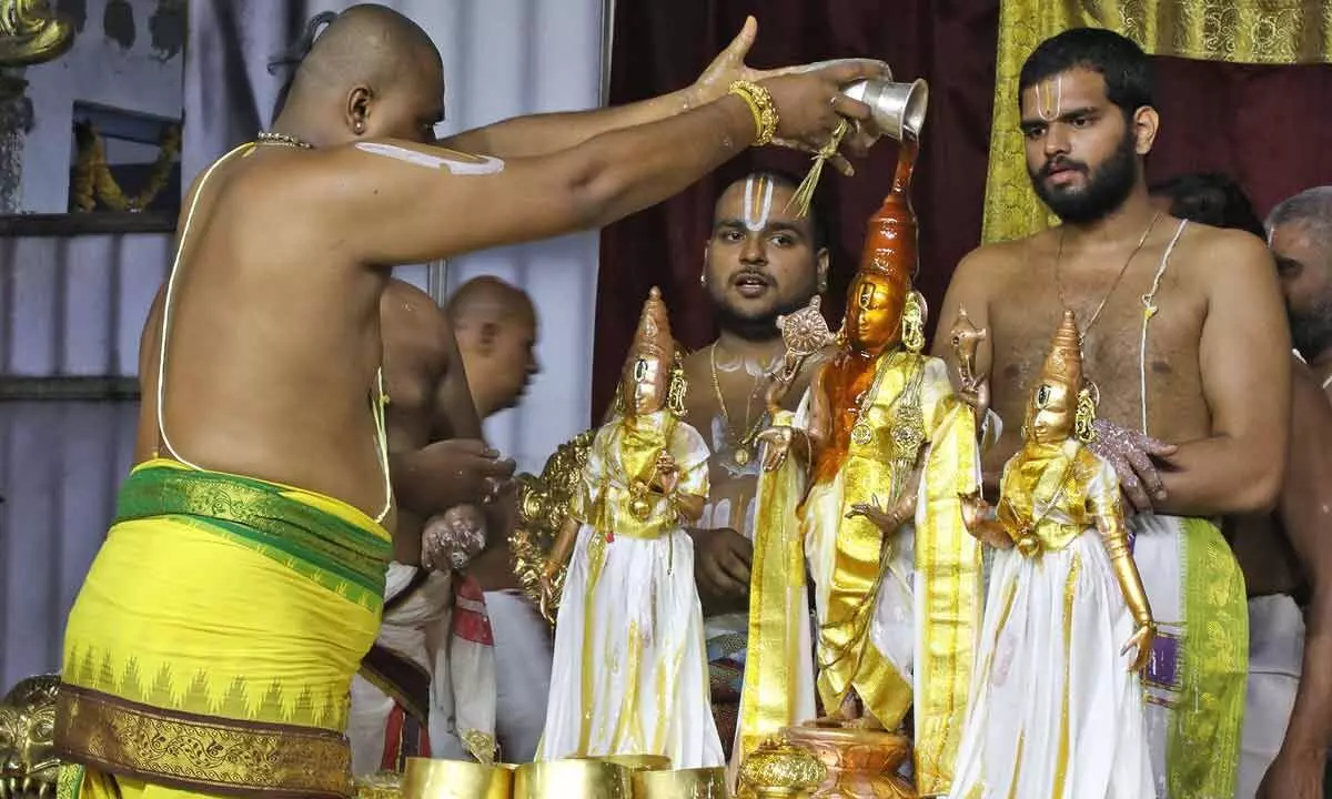 Priests performing Snapana Tirumanjanam on the last day of Jyeshtabhishekam in Tirumala temple on Sunday
