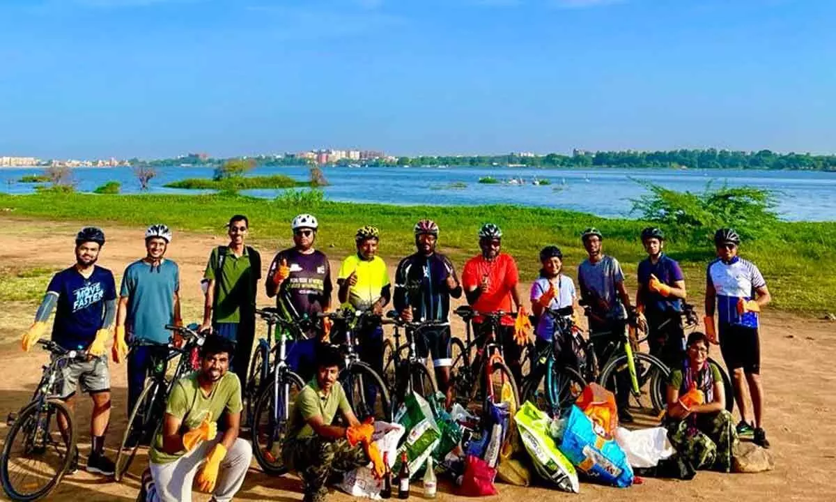 World Environment Day Cyclists clean-up Ameenpur lake bed