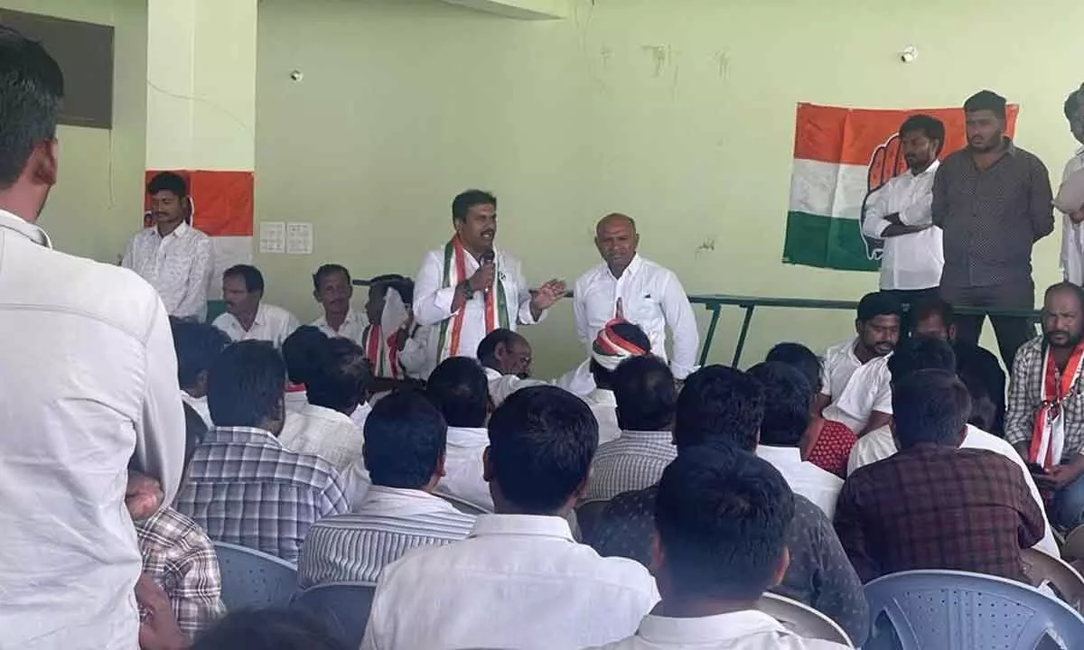 Leadership development mission coordinator Dharanidhar Reddy along with DCC president Shankar Naik addressing a meeting held in Narketpally on Tuesday