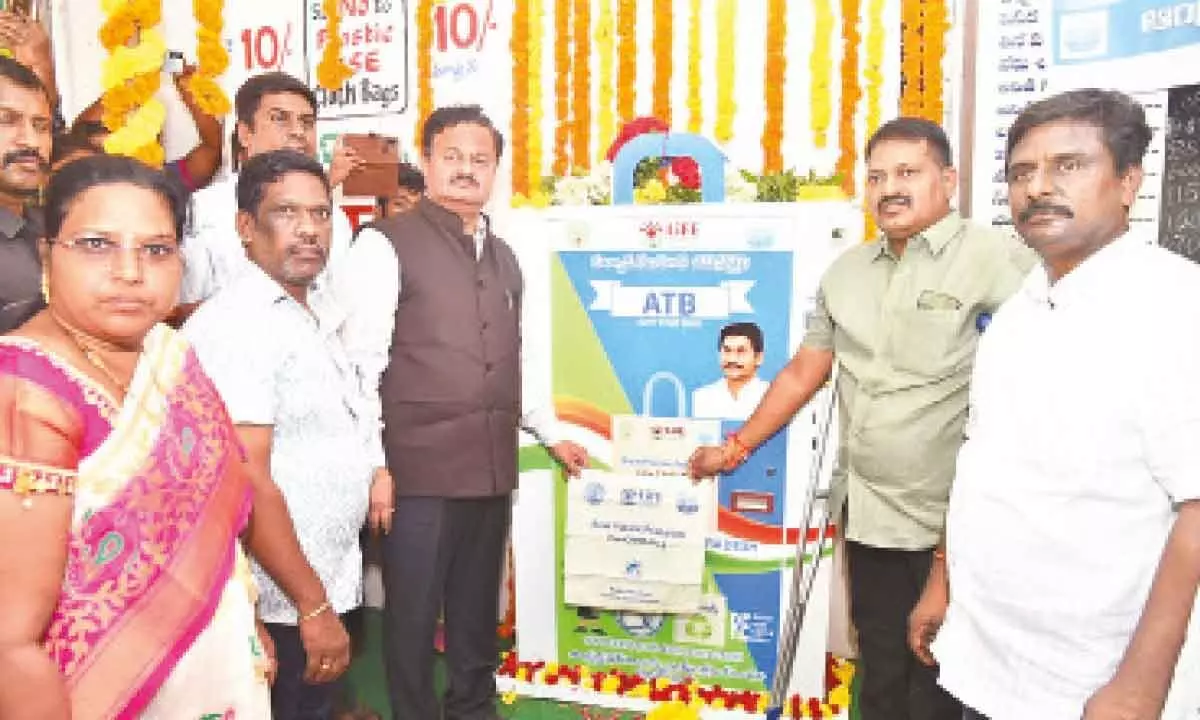 District Collector K Venkataramana Reddy inaugurating ATB vending machine set up by APPCB at Tirupati Rythu Bazar on Tuesday. APPCB EE Narendra Babu is also seen.