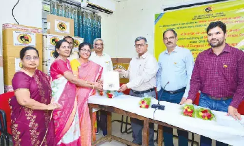 GAIL authorities handing over medical equipment to the officials of GGH in Rajahmundry on Tuesday