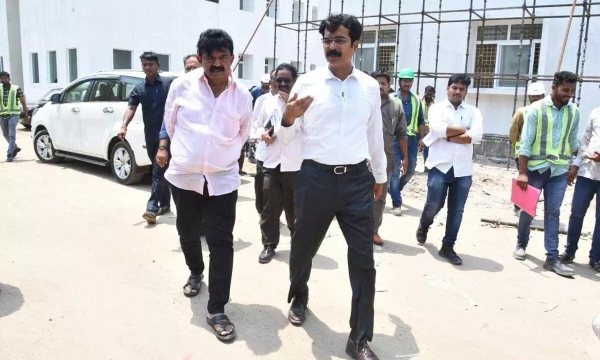 APMSIDC VC & MD D Muralidhar Reddy and MLA Perni Nani inspecting the medical college under construction in Machilipatnam on Wednesday