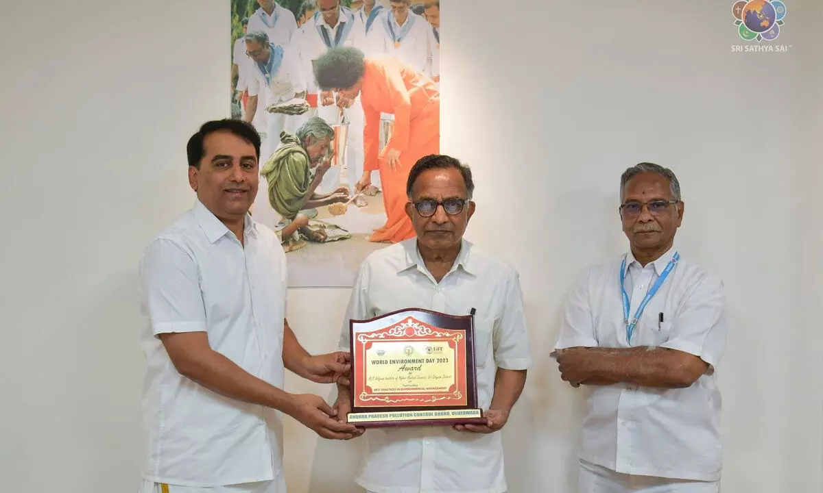 Dr Gurumurthy (Director, SSSIHMS-PG) and Sri P Haranath  (chief engineer) receiving the award during a function held by the AP Pollution Control Board in Vijayawada on Wednesday