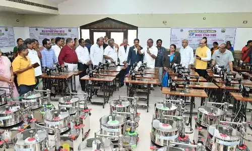 Sewing machines and wet grinders being handed over to self-employed women at Mega Seva Mahotsavam in Rajamahendravaram on Thursday
