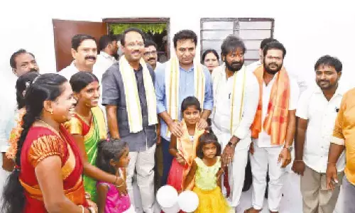 IT Minister KT Rama Rao,  Excise Minister Srinivas Goud, Jadcherla MLA Laxma Reddy, MP Manne Srinivas Reddy after handing over a double bedroom house to a beneficiary in Jadcherla on Thursday
