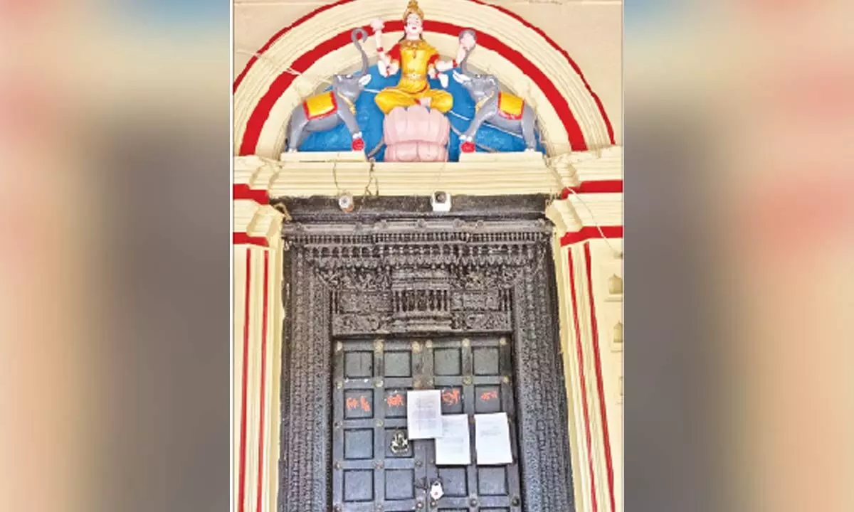 Notices pasted by Endowments officials on the seized Hathiramji Mutt main door