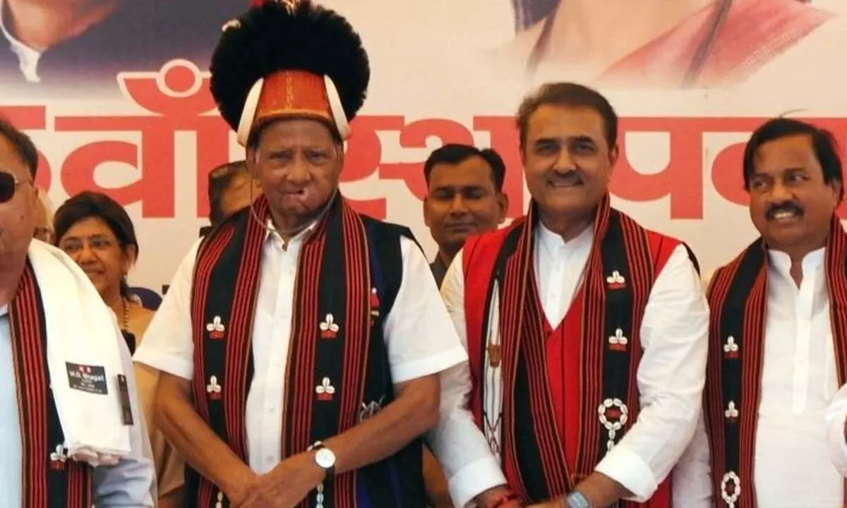 NCP chief Sharad Pawar with partys senior leaders Praful Patel and Chhagan Bhujbal during the partys foundation day celebrations in New Delhi on Saturday