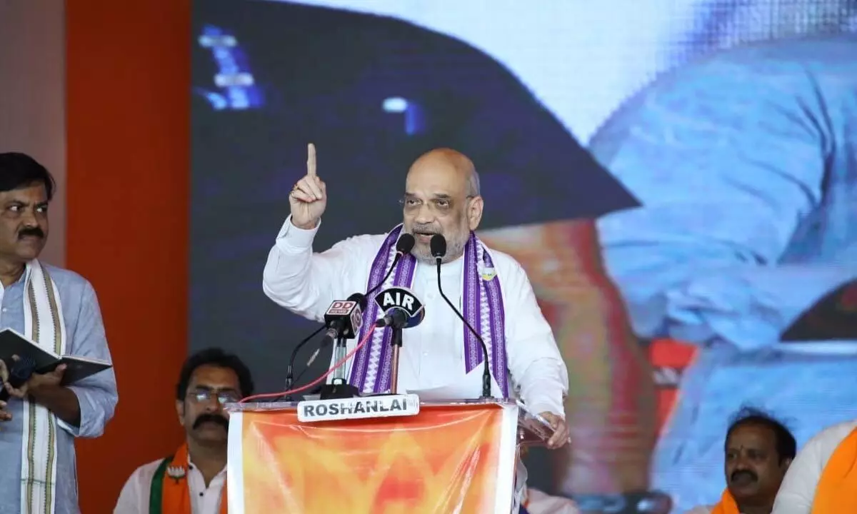 Union Home Minister Amit Shah addressing a public meeting in Visakhapatnam on Sunday