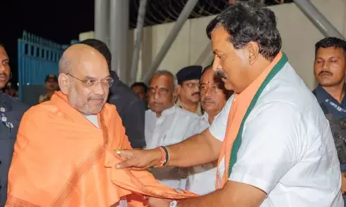 Tamil Nadu BJP co-incharge Dr Ponguleti Sudhakar Reddy welcoming Union Home Minister Amit Shah in Chennai on Sunday.