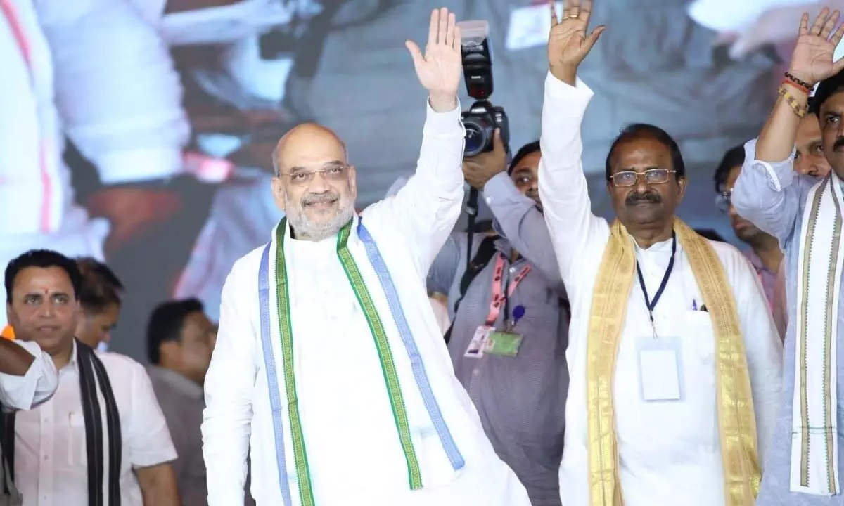Union Home Minister Amit Shah greeting people at a  recent public meeting in Visakhapatnam