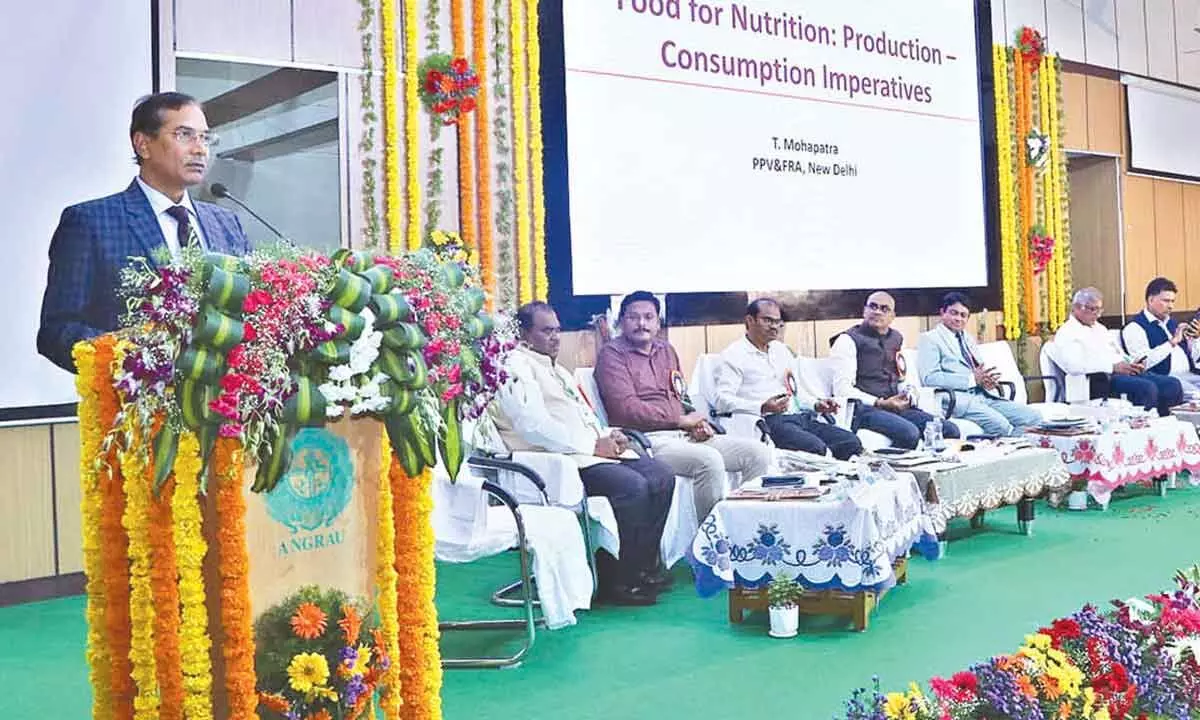 Former Director General of Indian Council of Agriculture Research Dr Trilochan Mohapatra  speaking at ANGRAU 59th foundation celebrations in Guntur on Monday. University  Vice-Chancellor A Vishnu Vardhan Reddy is also seen.
