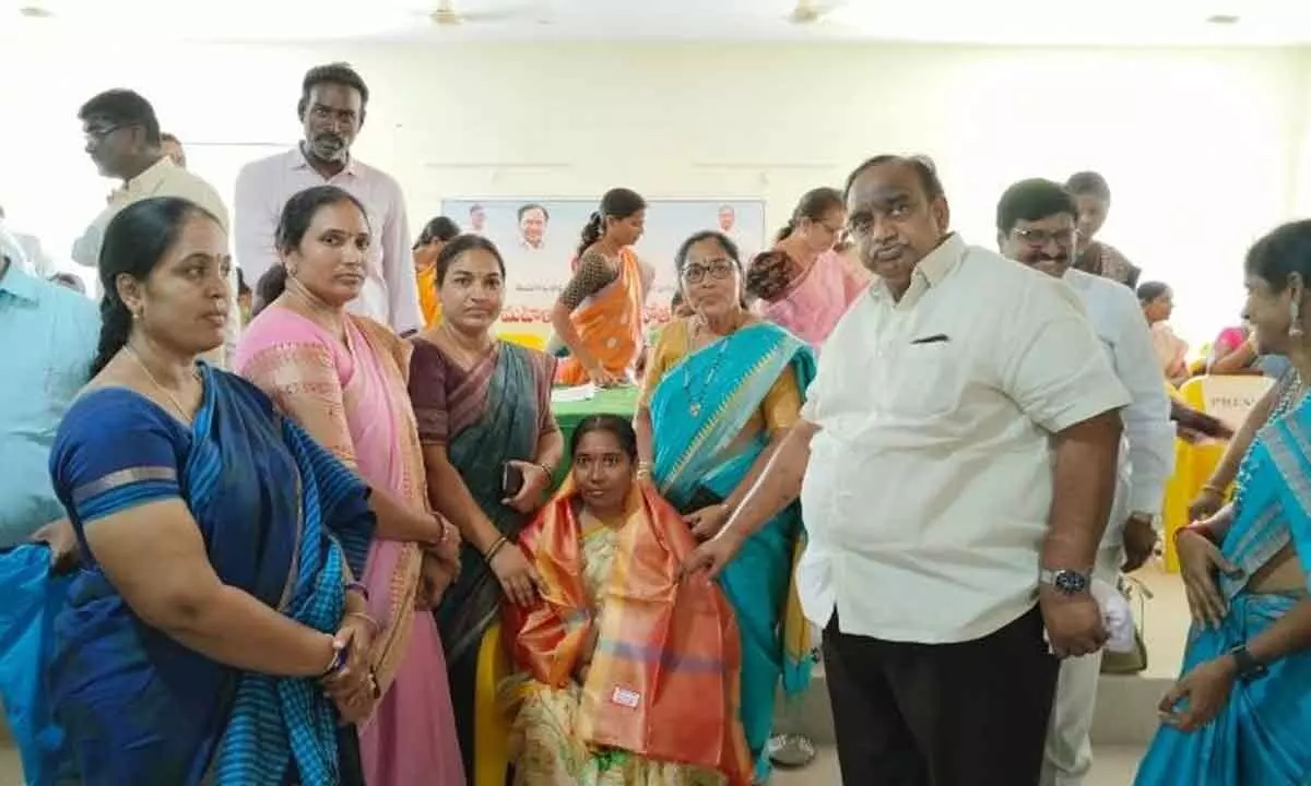 MLA Voditala Satish Kumar felicitating women employees and women public representatives in Husnabad on Tuesday