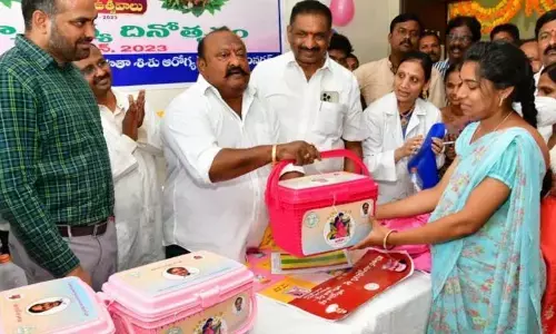 Minister G Kamalakar distributing KCR nutrition kits in Karimnagar on Wednesday