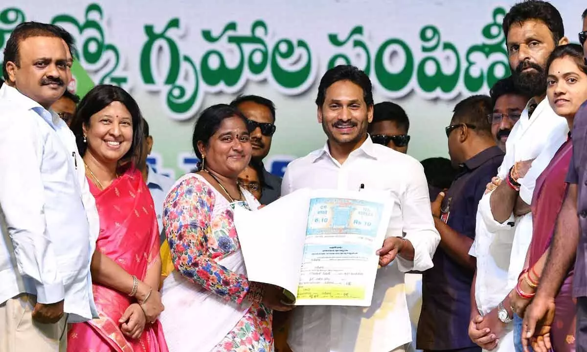 YS Jagan presents 8,912 houses to beneficiaries