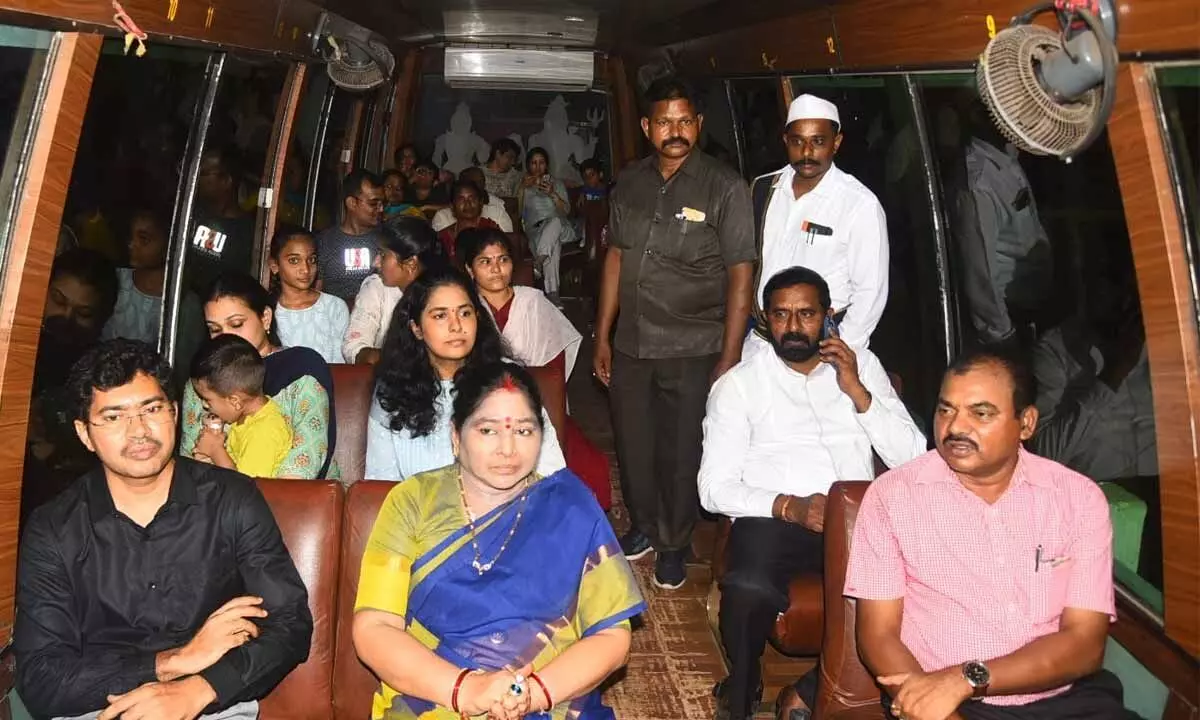 District Collector and VMRDA Commissioner A Mallikarjuna, VMRDA Chairperson A Vijaya Nirmala, among others taking a tour onboard a circular toy train that resumed its service at  Kailasagiri Hill Park in Visakhapatnam