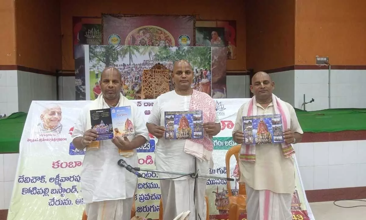 ISKCON Rajamahendravaram branch Chairman Shyamanga Srinivasa Das and others releasing the the brochures of the Jagannath Rath Yatra Mahotsavam in Rajamahendravaram on Saturday