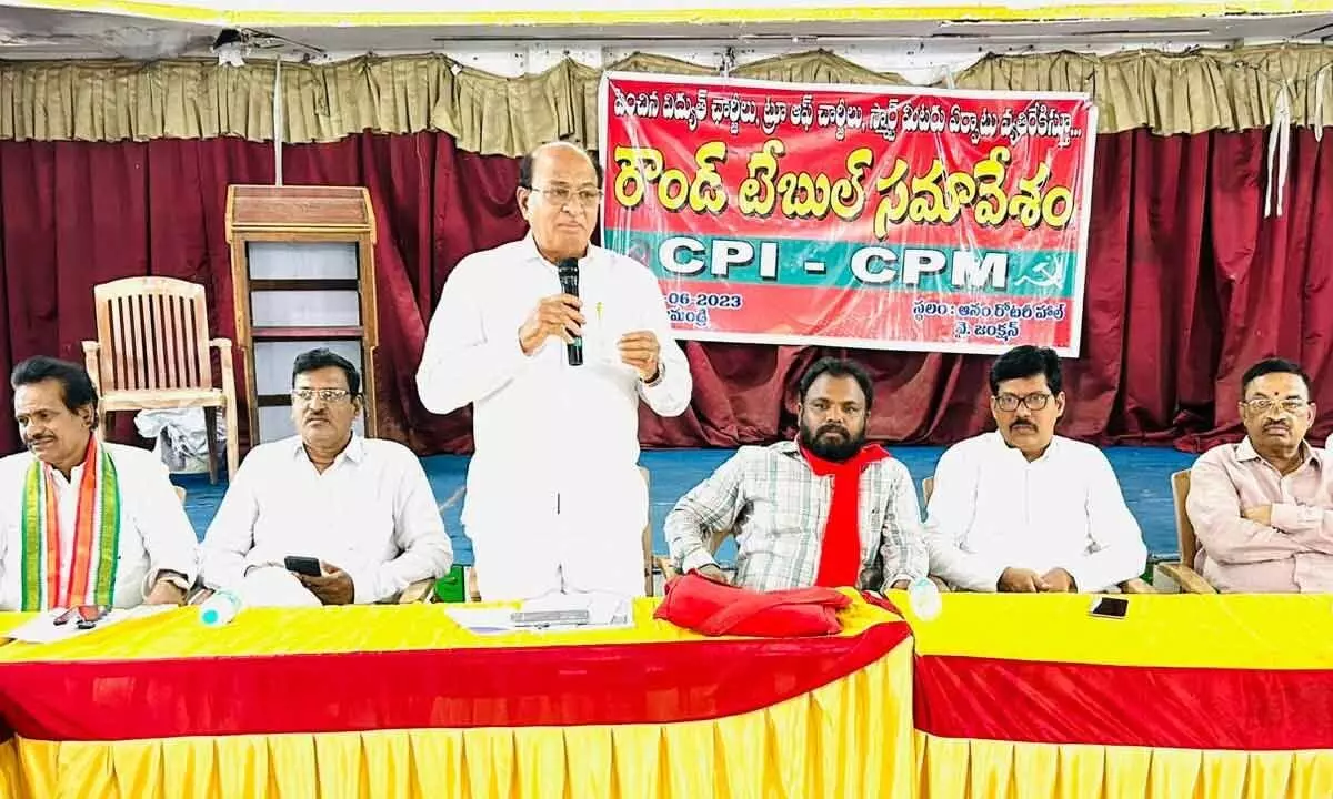 MLA Gorantla Butchiah Chowdary speaking at a roundtable meeting at Anam Rotary Hall in Rajamahendravaram on Sunday