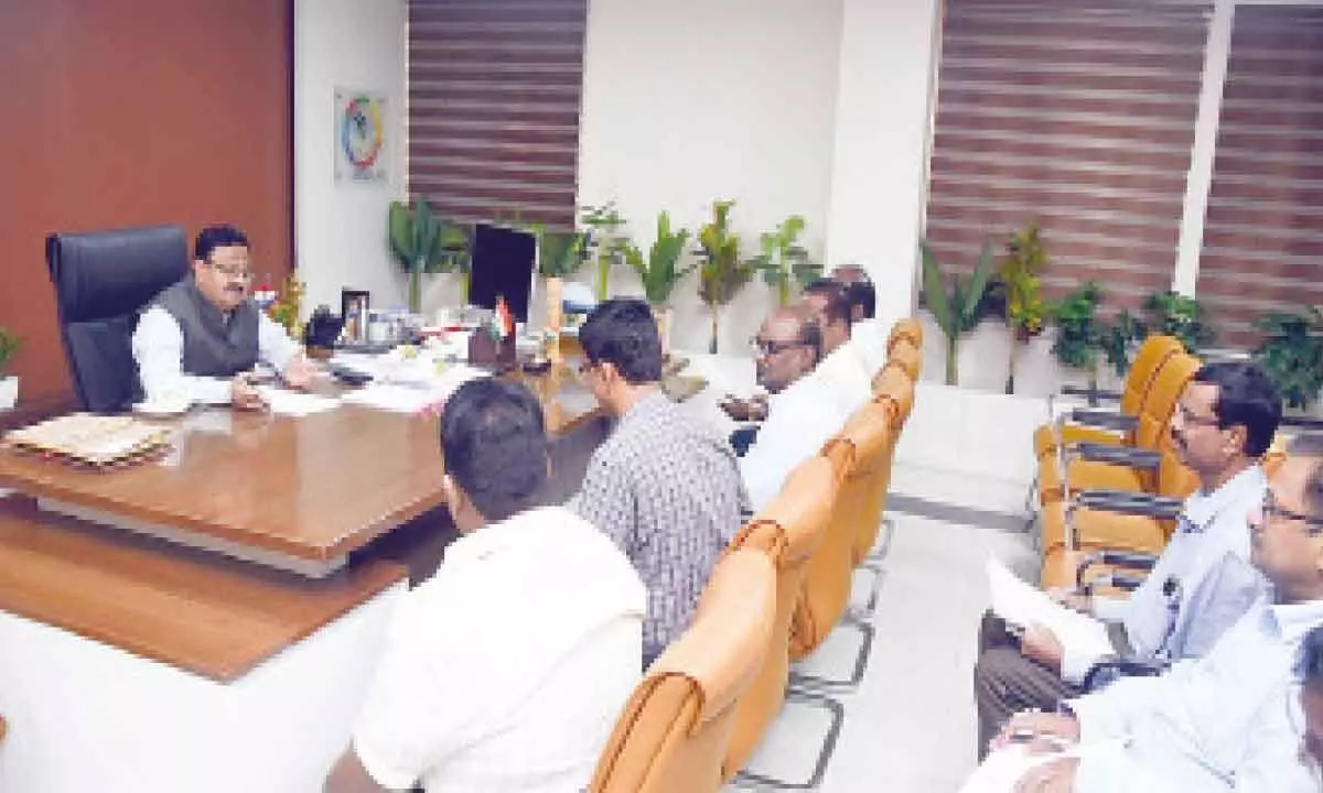 District Collector K Venkataramana Reddy speaking to the officials in a review meeting in Tirupati on Monday