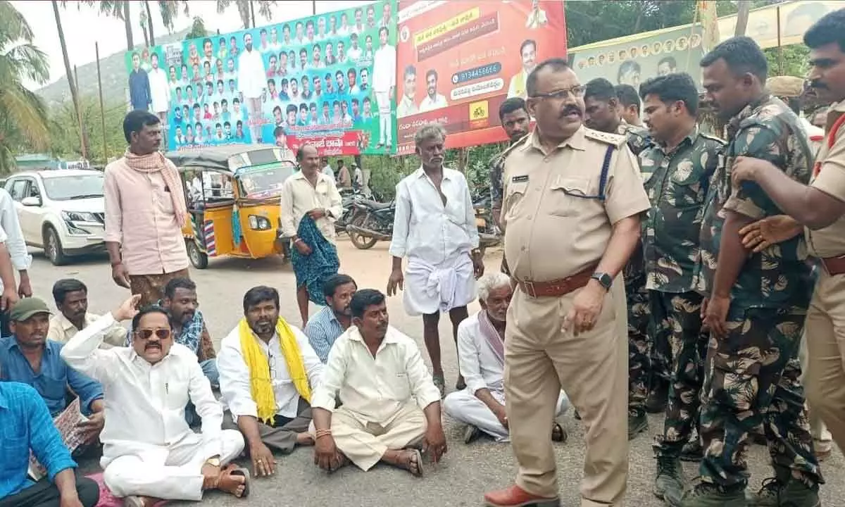 Sarpanch Prabhakar protesting along with his supporters in Chikilabailu village near Madanapalle on Monday