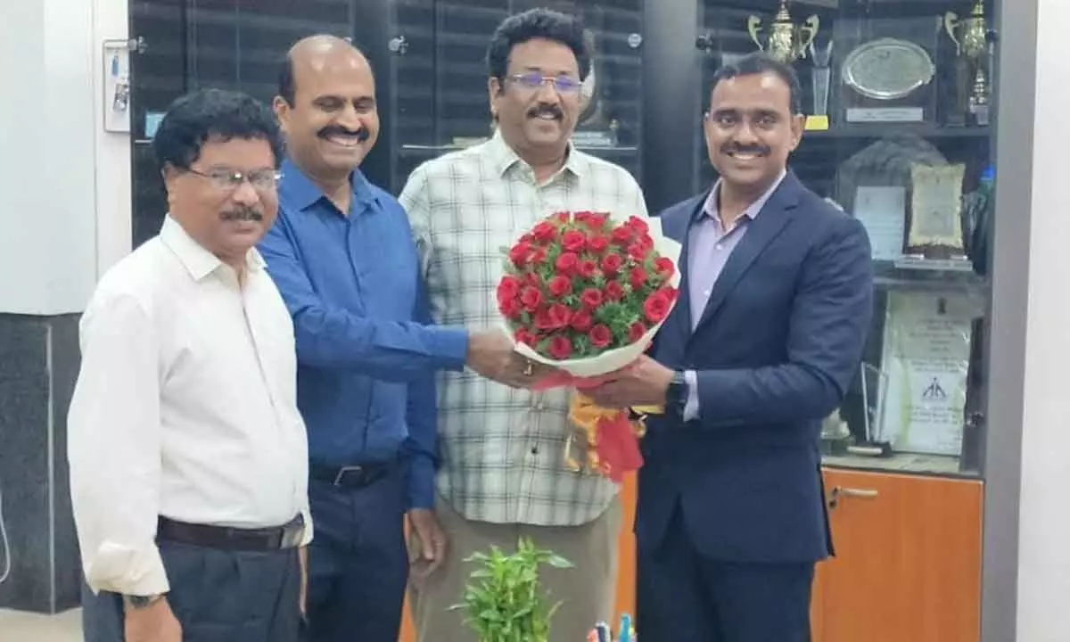 Representatives of Andhra Pradesh Air Travellers Association with new Airport Director S Raja Reddy in Visakhapatnam on Monday
