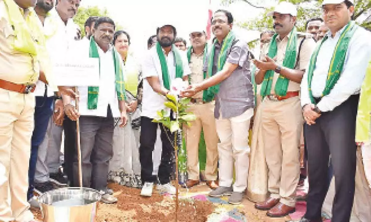 Minister Srinivas Goud and MLA Laxma Reddy planting a sapling at the Police Training Centre in Jadcherla on Monday