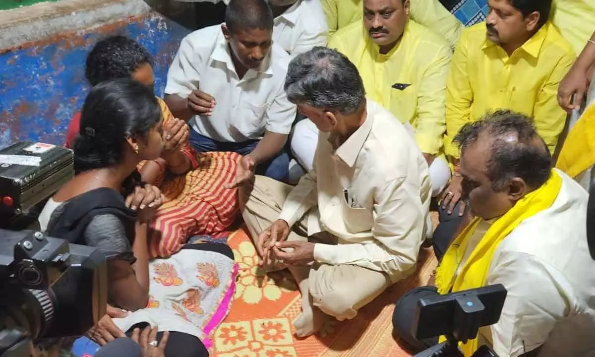 TDP national president N Chandrababu Naidu and State president K Achannaidu consoling the family members of Amarnath at  Uppalavaripalem village on Monday